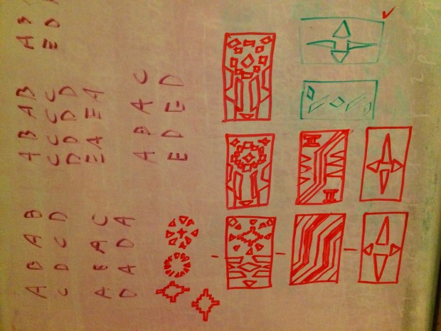 Drafts on whiteboard of the Kente pattern squares, with letters to the left that I used in deciding how to arrange the squares into the pattern